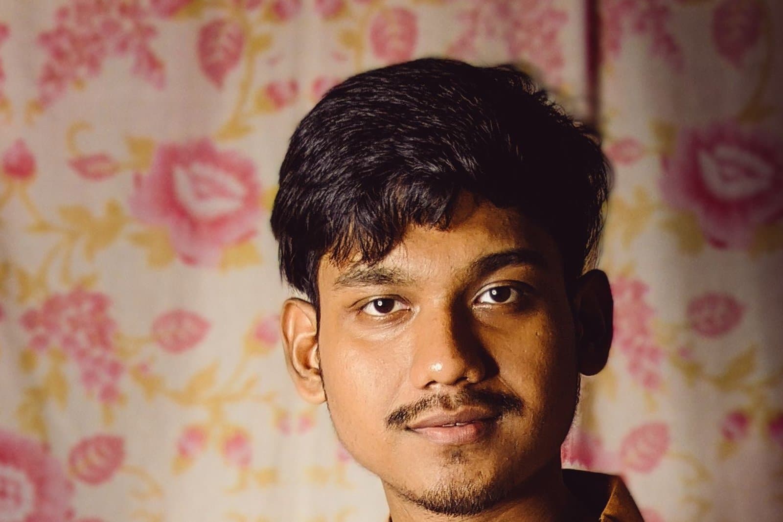 Man facing the camera in even light